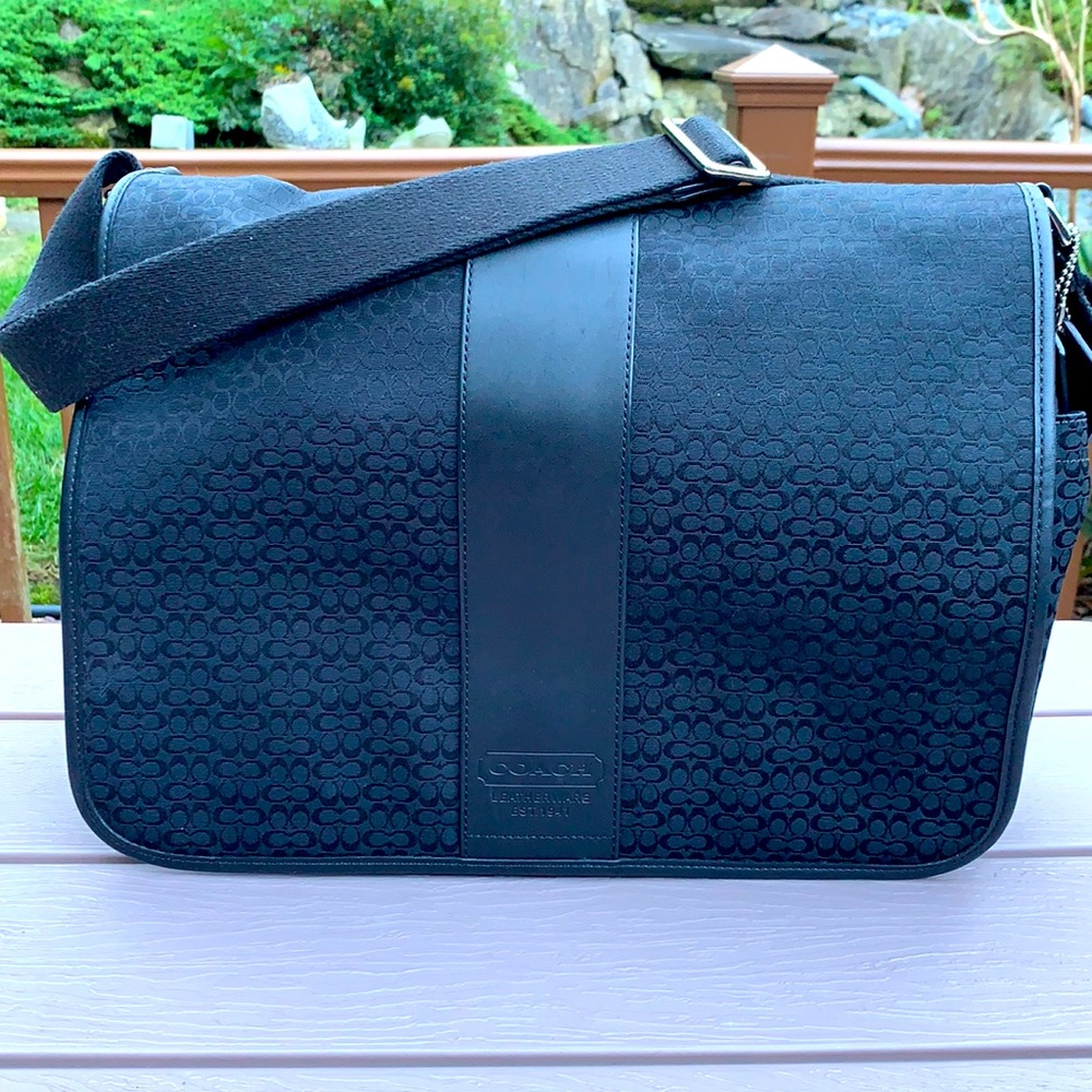 Rarely used, excellent condition black signature Coach Crossbody messenger bag,